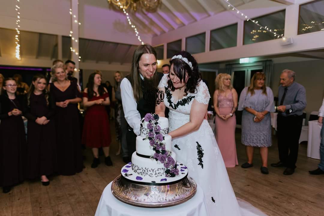 Lou and partner on their wedding day