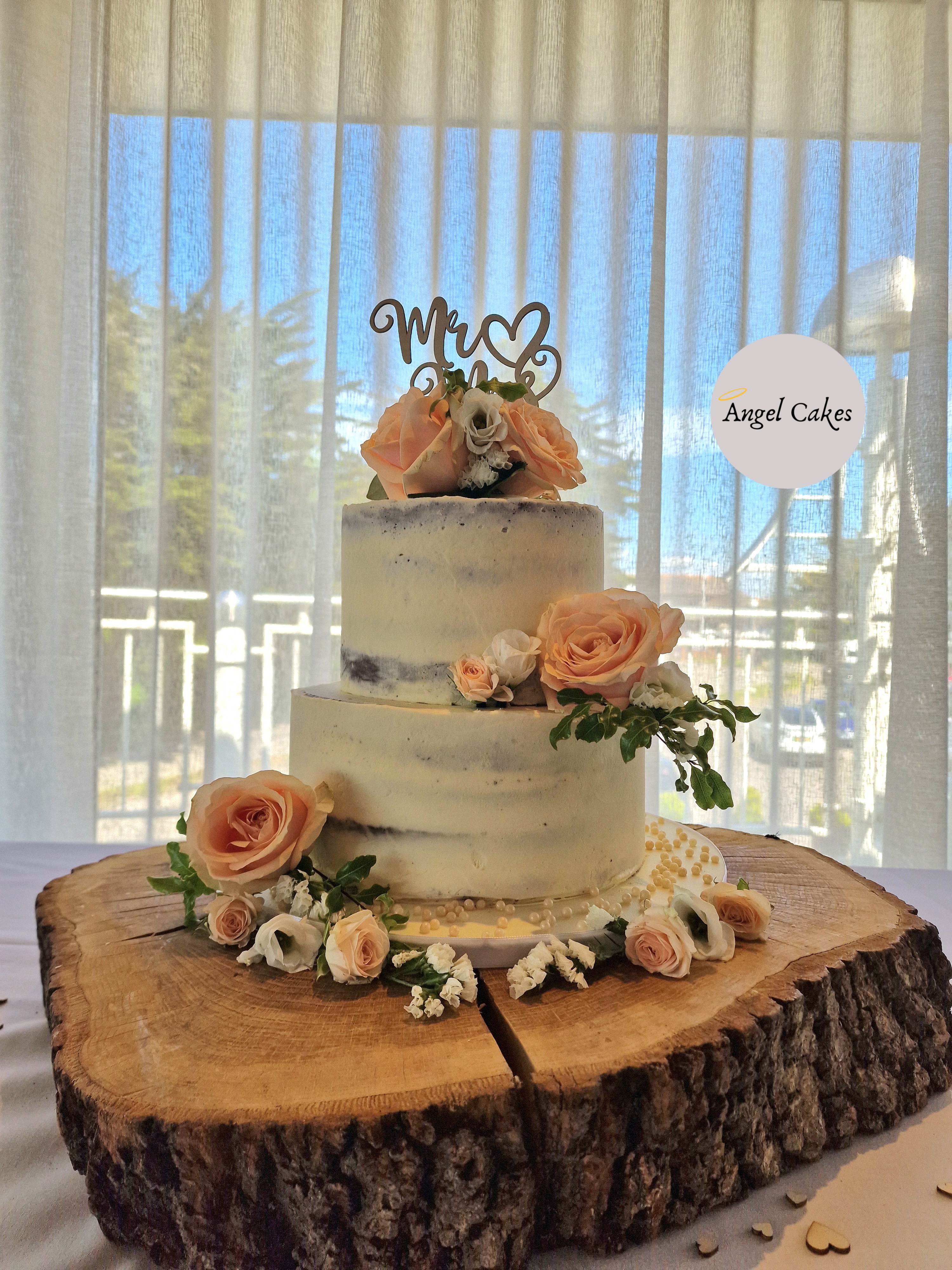 Semi-naked tiered wedding cake