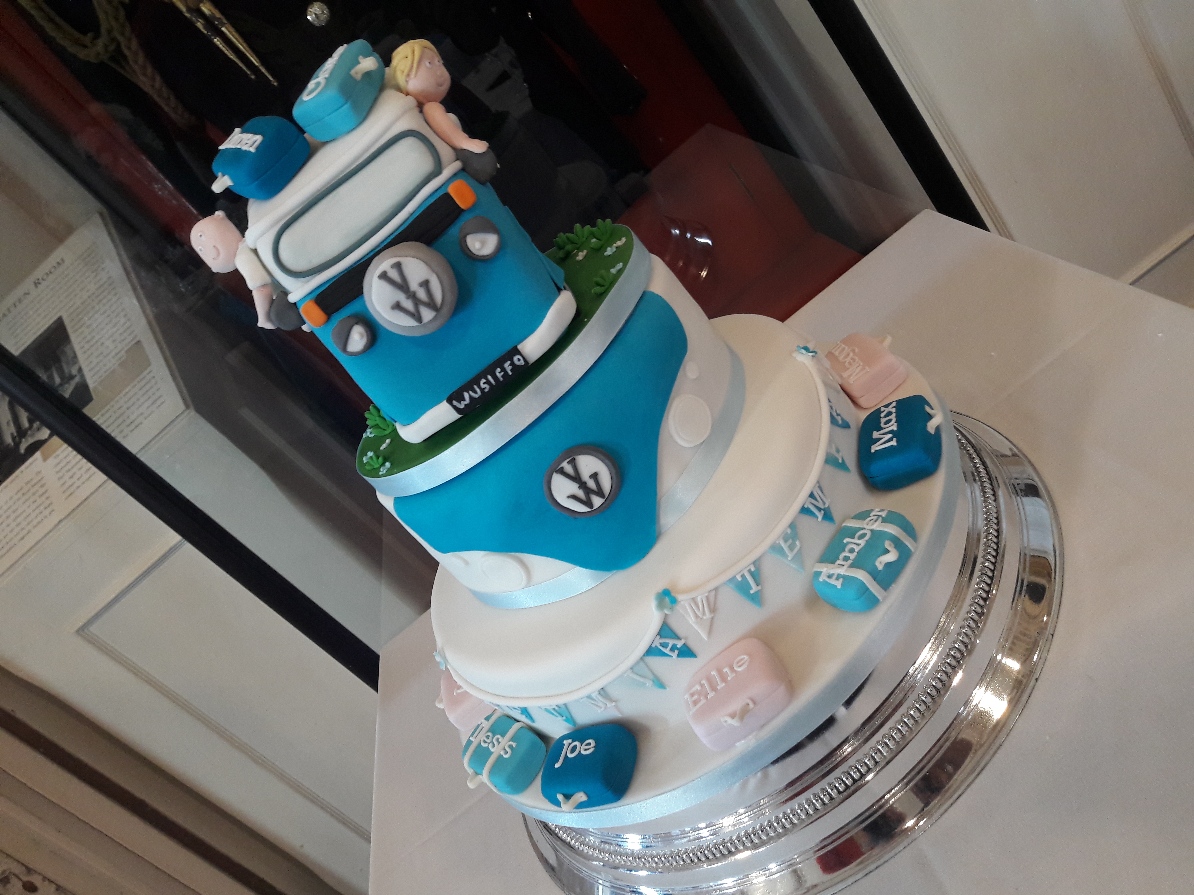 Blue VW campervan wedding cake with fondant figures